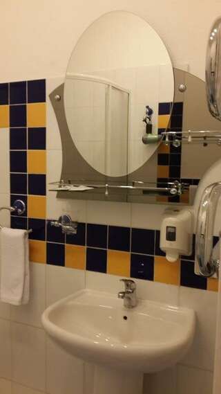 Гостиница Каргополь Каргополь Номер стандарт улучшенный с 4 односпальными кроватями-6